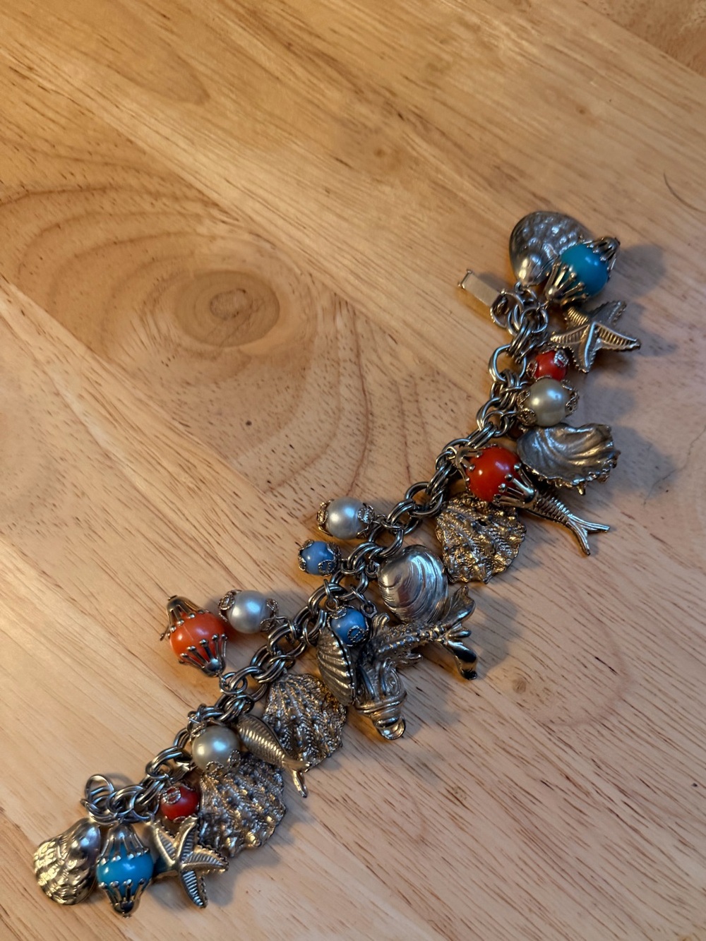 Vintage Gold-Tone Nautical Charm Bracelet with Blue and Coral Accents